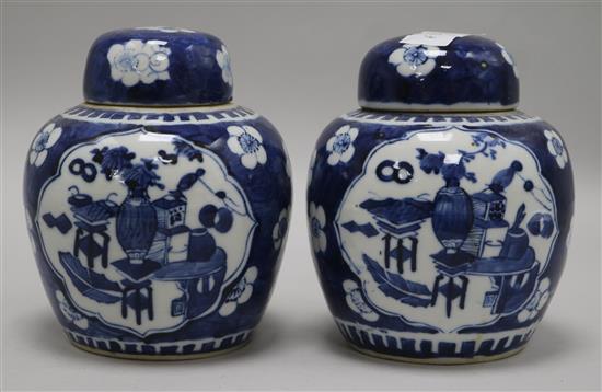 A pair of Chinese blue and white jars and covers